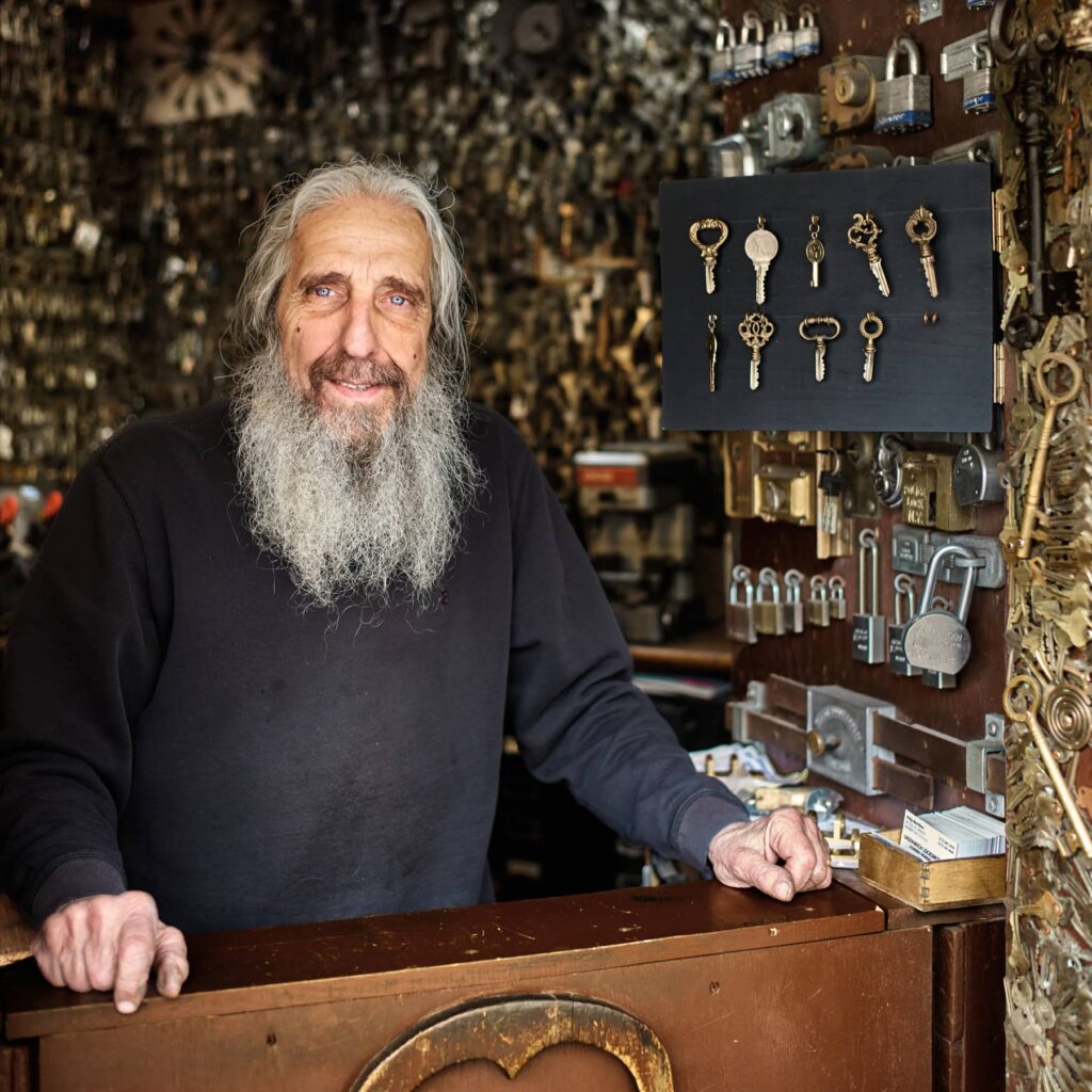 Philip Mortillaro owner of Greenwich Locksmiths poses with his castle keys